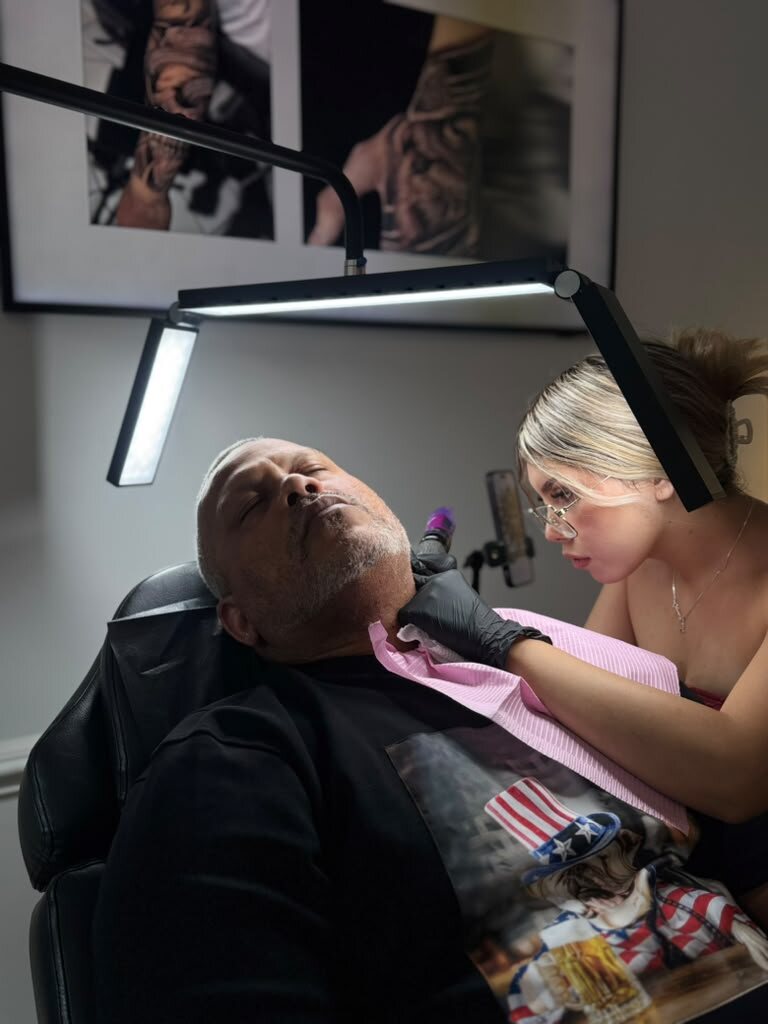 Artist tattooing